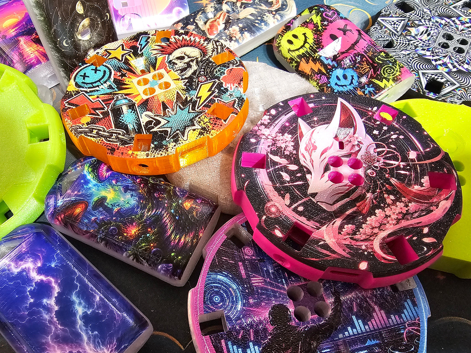 A collection of colorful, decorated plastic toy containers and cases with vibrant psychedelic designs, including lightning patterns, smiley faces, skulls, and fantasy characters.